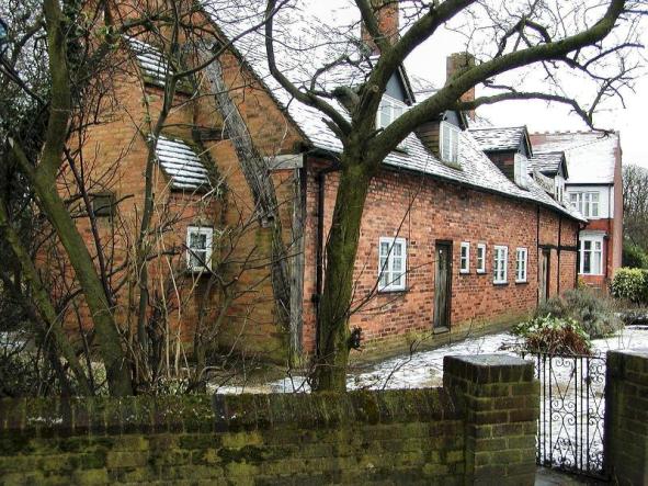 The row of listed cottages which date from the Sixteenth century which at one time were used as Handsworth Town Hall. They stand behind St Andrews Church in Oxhill Road.