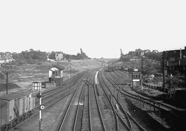 Panoramic view of the approaches on the Coventry side of Stechford station with the down sidings on the right as seen on 7th September 1957. Amateur photographer Dennis Norton is standing on Station Road bridge with Hill House bridge in the distance. Stechford No 1 Signal Box is seen on the left. On the right is the “hump” used to 'fly shunt' wagons in to the down sidings. [Photo by DJ Norton]