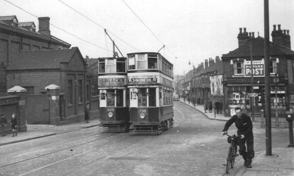Tram 738 & 825 on Pershore Road at junction with Fordhouse Lane. The shop on the right is where the runaway tram came to rest in 1942.